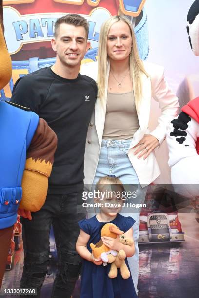 Max Whitlock, Leah Hickton and daughter Willow attend the "Paw Patrol" movie special screening at Vue Leicester Square on August 08, 2021 in London,...