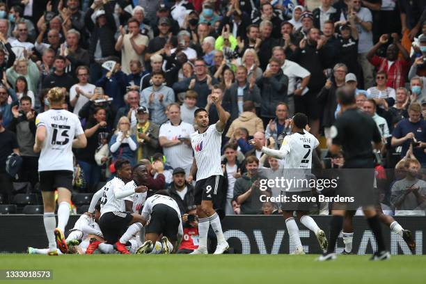 The Fulham players celebrate Harry Wilson's opening goal during the Sky Bet Championship match between Fulham and Middlesbrough at Craven Cottage on...