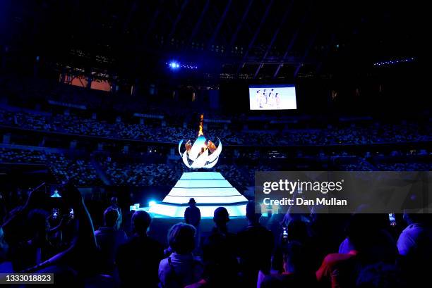 The olympic flame is extinguished during the Closing Ceremony of the Tokyo 2020 Olympic Games at Olympic Stadium on August 08, 2021 in Tokyo, Japan.