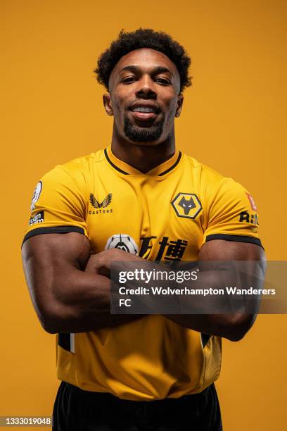 Adama Traore of Wolverhampton Wanderers poses for a portrait in the Wolverhampton Wanderers 2021/22 Home Kit at Molineux on August 03, 2021 in...