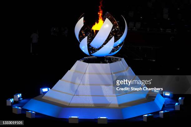 The olympic flame is extinguished during the Closing Ceremony of the Tokyo 2020 Olympic Games at Olympic Stadium on August 08, 2021 in Tokyo, Japan.