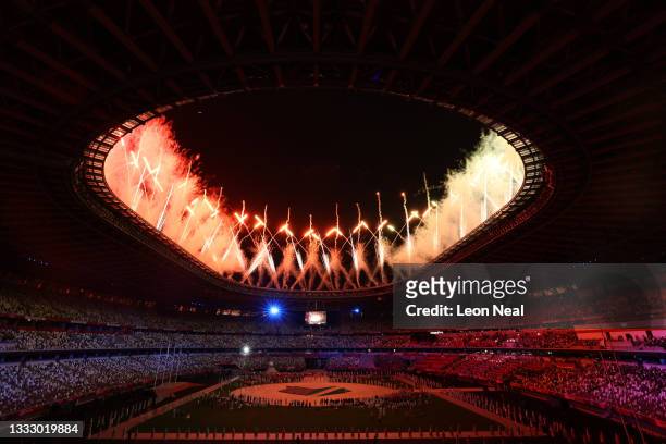 Fireworks erupt above the stadium during the Closing Ceremony of the Tokyo 2020 Olympic Games at Olympic Stadium on August 08, 2021 in Tokyo, Japan.