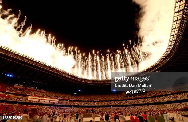 Fireworks erupt above the stadium during the Closing Ceremony of the Tokyo 2020 Olympic Games at Olympic Stadium on August 08, 2021 in Tokyo, Japan.