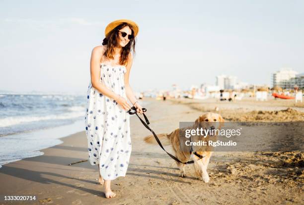 happy woman on vacation - dog agility stock pictures, royalty-free photos & images