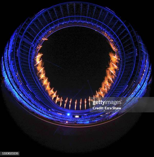 Fireworks erupt above the stadium during the Closing Ceremony of the Tokyo 2020 Olympic Games at Olympic Stadium on August 08, 2021 in Tokyo, Japan.