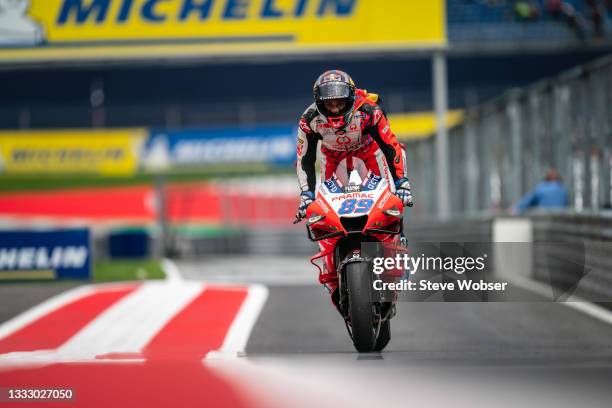 Jorge Martin of Spain and Pramac Racing with Spanish flag - rolls into parc ferme after he wins his first MotoGP race during the MotoGP race -...