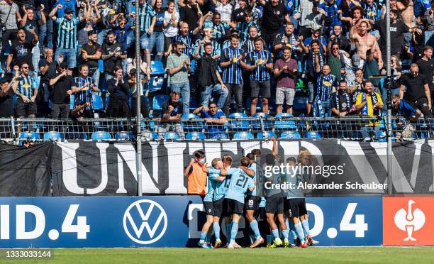 Marcel Seegert of Waldhof Mannheim celebrates the first goal for his team with his teammates during the DFB Cup first round match between Waldhof...