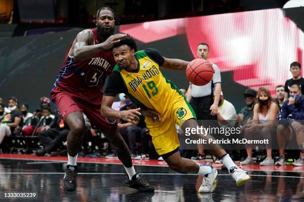 Leandro Barbosa of the Ball Hogs dribbles the ball while being guarded by Earl Clark of Tri State during BIG3 - Week Six at Credit Union 1 Arena on...