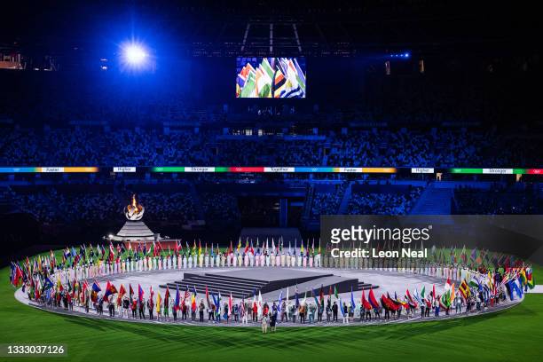 General view as the flag bearers of the competing nations enter the stadium during the Closing Ceremony of the Tokyo 2020 Olympic Games at Olympic...