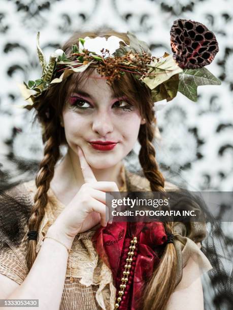 bts portrait of young actress against backdrop - theatre costume stock pictures, royalty-free photos & images