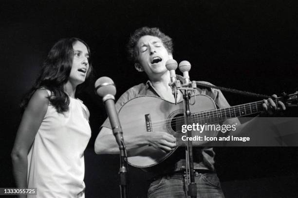 American singer-songwriter, musician, and author Bob Dylan is accompanied by American folk singer Joan Baez during Dylan's iconic performance at the...