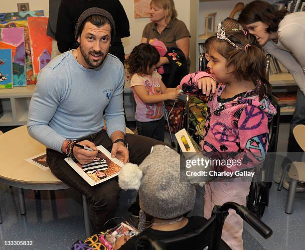 Dancer Maksim Chmerkovskiy delivers hundreds of toys to Children's Hospital Los Angeles as part of the Cost Plus World Market "Share the Joy"...