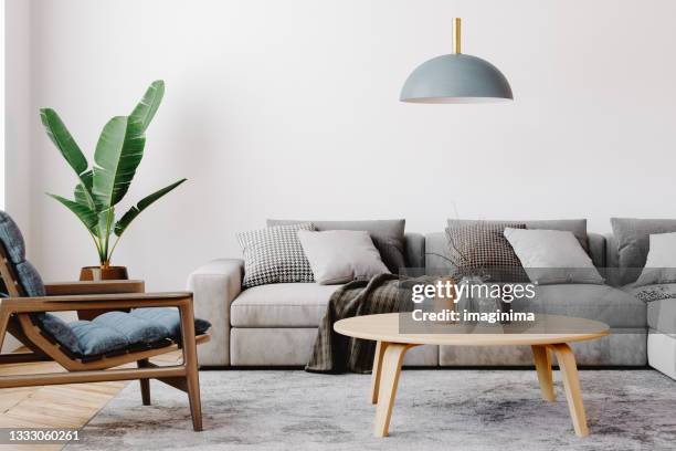 design degli interni del soggiorno moderno - tavolino foto e immagini stock