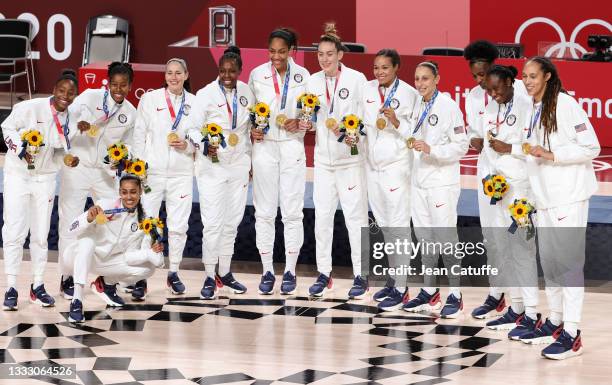 Team USA celebrate during the medal ceremony of the Women's Basketball Gold Medal Final between United States and Japan on day sixteen of the Tokyo...