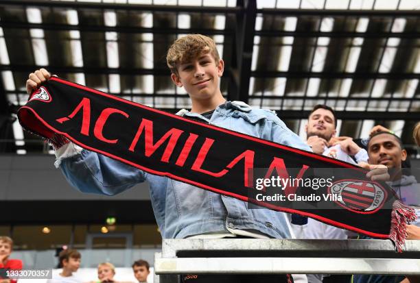 Milan fans are seen during the pre-season friendly match between Real Madrid and AC Milan at Worthersee Stadion on August 08, 2021 in Klagenfurt,...