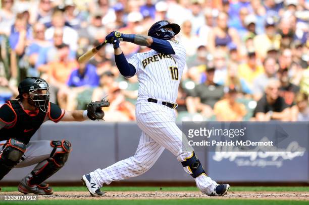 Omar Narvaez of the Milwaukee Brewers hits a two-run home run in the fourth inning against the San Francisco Giants at American Family Field on...