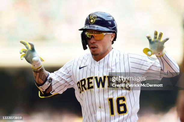 Kolten Wong of the Milwaukee Brewers celebrates after hitting an RBI single in the fifth inning against the San Francisco Giants at American Family...