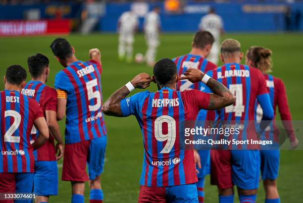 Memphis Depay of FC Barcelona celebrates after scoring his team's first goal during the Joan Gamper Trophy match between FC Barcelona and Juventus at...