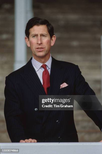 British Royal Charles, Prince of Wales standing on The Kop during a visit to Anfield, the home of Liverpool FC, to pay his respects to those who lost...