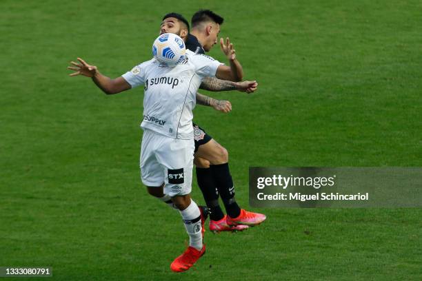 Felipe Jonatan of Santos fight for the ball against Gustavo Mosquito of Corinthians during a match between Santos and Corinthians as part of...