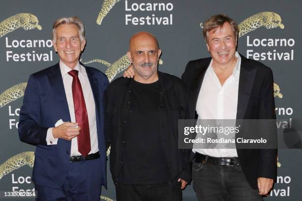 President of Locarno Film Festival Marco Solari, director Gaspar Noé and Olivier Père attend the red carpet during the 74th Locarno Film Festival on...