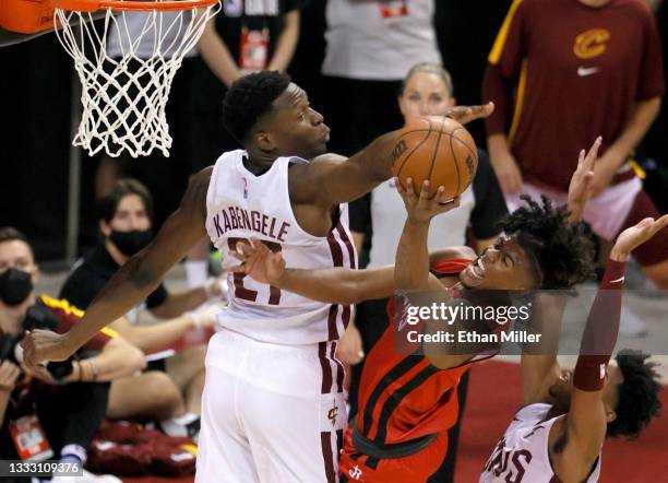 Mfiondu Kabengele of the Cleveland Cavaliers blocks a shot by Jalen Green of the Houston Rockets during the 2021 NBA Summer League at the Thomas &...