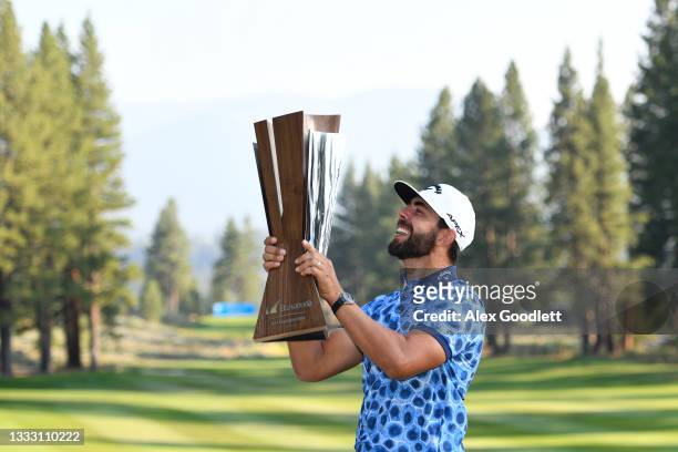 Erik van Rooyen of South Africa celebrates with the trophy after winning during the final round of the Barracuda Championship at Tahoe Mountain...