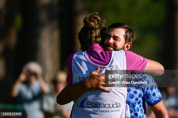 Erik van Rooyen of South Africa celebrates with caddie Alex Gaugert after winning on the 18th green during the final round of the Barracuda...