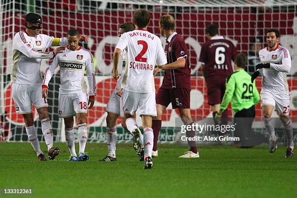 Michael Ballack celebrates his team's second goal with team mate Michael Ballack during the Bundesliga match between 1. FC Kaiserslautern and Bayer...