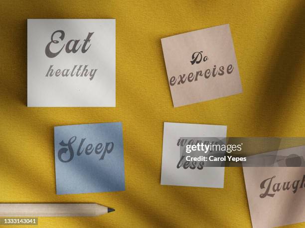 healthy lifestyle and wellbeing concept - a set of inspirational reminder notes - diet journal - fotografias e filmes do acervo