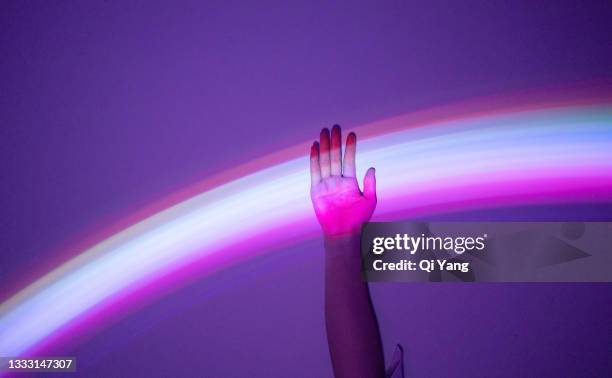 touching the rainbow - geschlechtsdiskriminierung stock-fotos und bilder