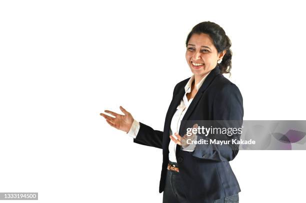 portrait of a mid age woman smiling and talking against white background - business woman side stockfoto's en -beelden