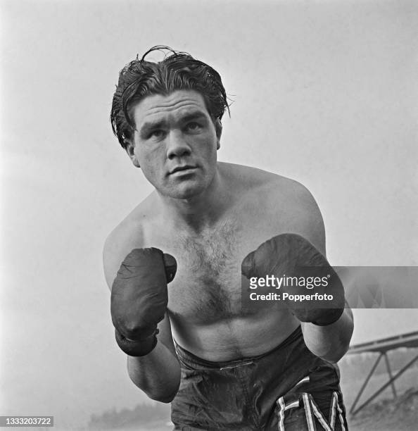 English heavyweight boxer Freddie Mills , a sergeant in the Royal Air Force, trains at a RAF facility in England during World War II on 17th November...