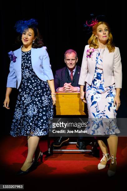Eliza Butterworth as Princess Eugenie, Tim Wallers as Prince Andrew and Jenny Rainsford as Princess Beatrice during dress rehearsals of the play "The...
