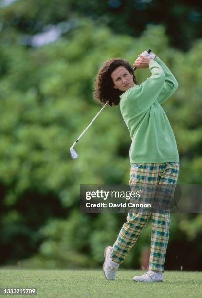 Golfer Diane Barnard of Great Britain plays a shot off the fairway during a photoshoot for Pringle on 15th December 1992 at the Tryall Golf Club near...