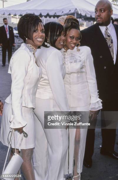 American R&B group Xscape , wearing matching white outfits, attend the 10th Annual Soul Train Music Awards held at the Shrine Auditorium in Los...