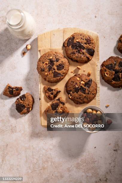 chocolate and hazelnuts homemade cookies with milk - biscuit france stock pictures, royalty-free photos & images