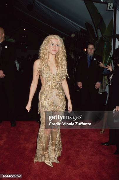 Colombian singer and songwriter Shakira, wearing a gold evening gown, attends the 43rd Annual Grammy Awards, held at the Staples Center in Los...