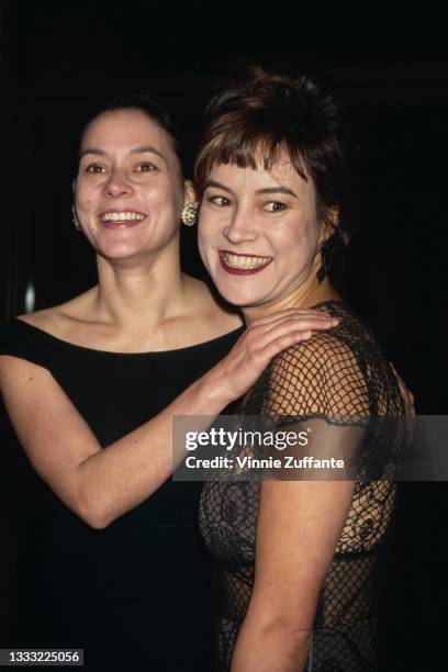 American-Canadian actress Meg Tilly and her sister, American-Canadian actress Jennifer Tilly attend the Westwood premiere of 'That's Entertainment...