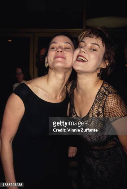 American-Canadian actress Meg Tilly and her sister, American-Canadian actress Jennifer Tilly attend the Westwood premiere of 'That's Entertainment...