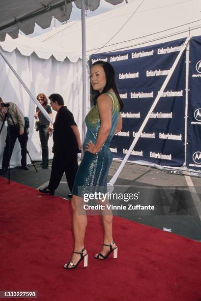 American-Canadian actress Jennifer Tilly, wearing a green-and-blue dress, attends the 15th Annual IFP/West Independent Spirit Awards at Santa Monica...