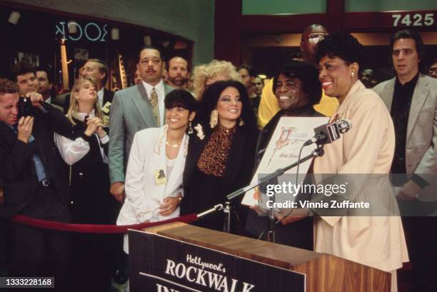 Yamma Brown, James Brown's daughter, with Brown's wife Adrienne Rodriguez and American singer, songwriter and musician James Brown among unspecified...