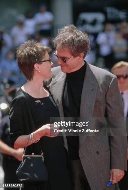 American actress Annette Bening and her husband, American actor Warren Beatty attend Beatty's hand-and-footprints-in-cement ceremony at Mann's...