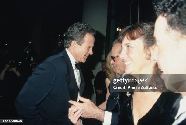 American actor Warren Beatty and American actor Jack Nicholson among unspecified people attending the 23rd Annual American Film Institute Lifetime...