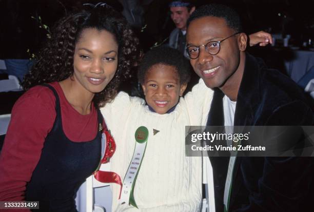 Haitian-born American actress and fashion model Garcelle Beauvais with her son, Oliver Saunders, and her husband, producer Daniel Saunders, attend...