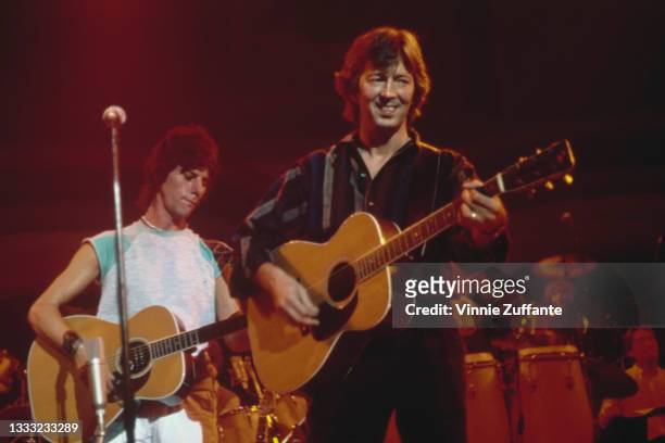 British guitarist and songwriter Jeff Beck, wearing a white cap sleeve t-shirt, with blue detail on the sleeves, and British guitarist and songwriter...