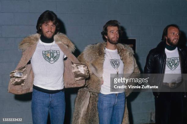 British pop group The Bee Gees , each wearing Police Athletic League t-shirts, visit the Police Athletic League headquarters at West 57th Street in...
