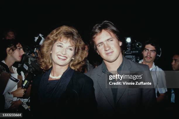 British actress Stephanie Beacham and an unspecified male companion attend the Beverly Hills premiere of 'Frankie & Johnny', held at the Samuel...