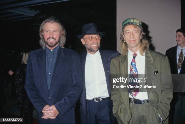 British pop group The Bee Gees attend Arista Records Pre-Grammy Party, ahead of the 38th Annual Grammy Awards, held at the Beverly Hills Hotel in...