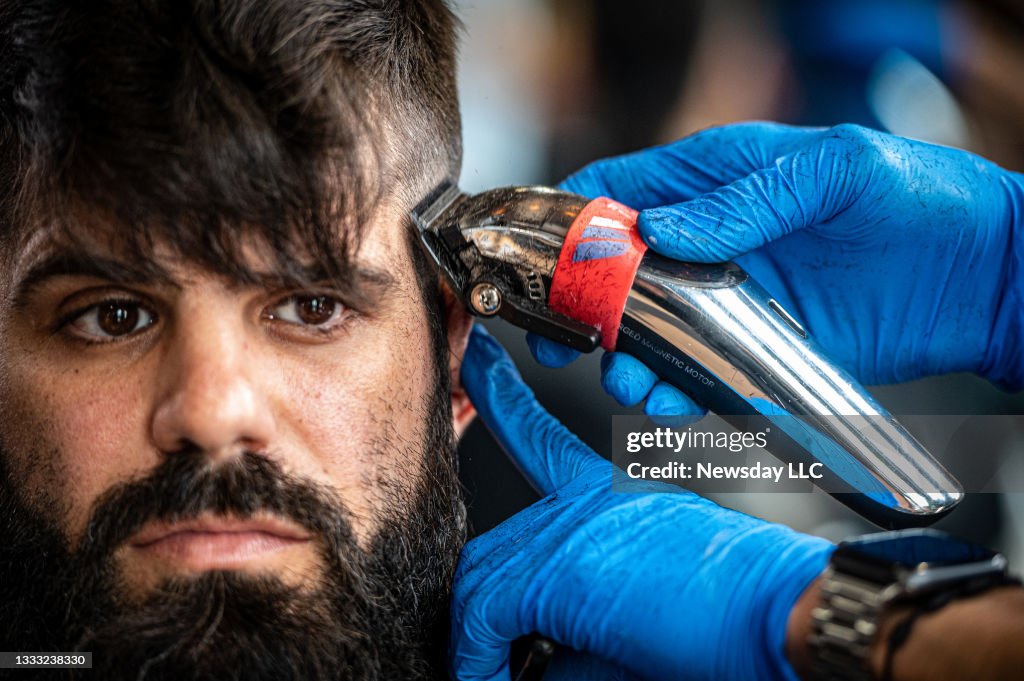 Long Island barber gives man a modern mullet cut